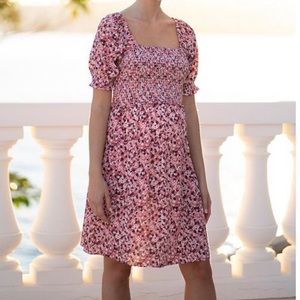 Seraphine shirred pink floral print maternity dress.